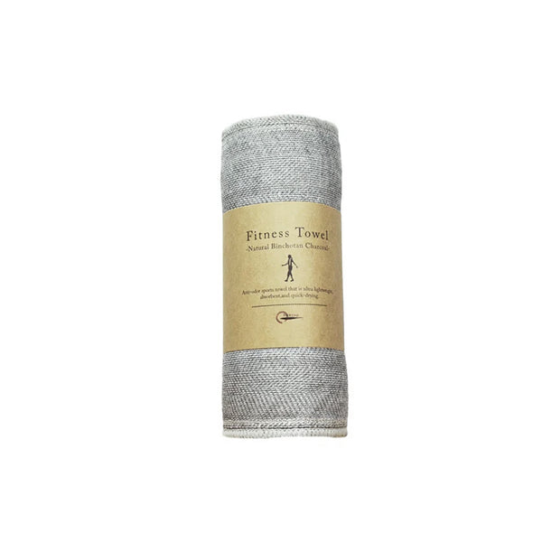 A Nawrap ORGANIC FITNESS TOWEL with a label on it, known for its exceptional water absorbency.
