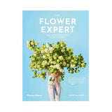 The "The Flower Expert | Ideas and inspiration for a life with flowers" book cover with a woman holding a bouquet of flowers.