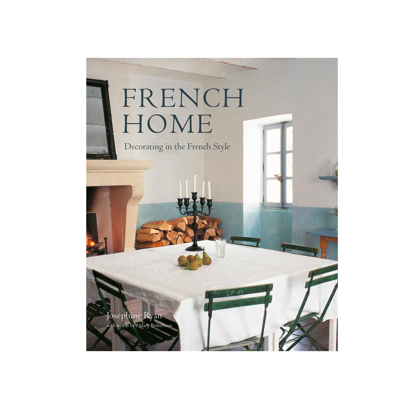 The cover of "French Home | Decorating in the French style" by Books featuring a table and chairs, showcasing French style.