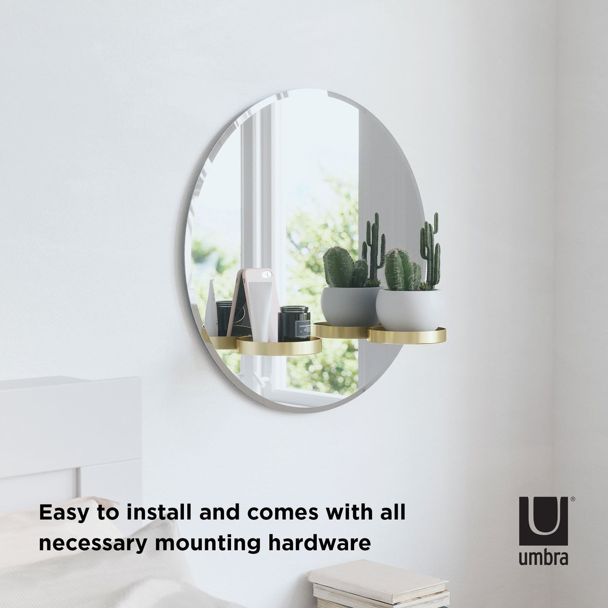 Umbra Perch round mirror on a wall, supplied with all necessary mounting hardware
