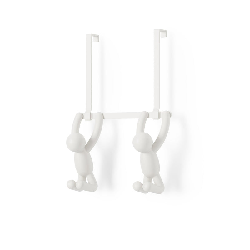 Two people hanging from a Umbra Buddy Over the Door Hook White on a white wall.