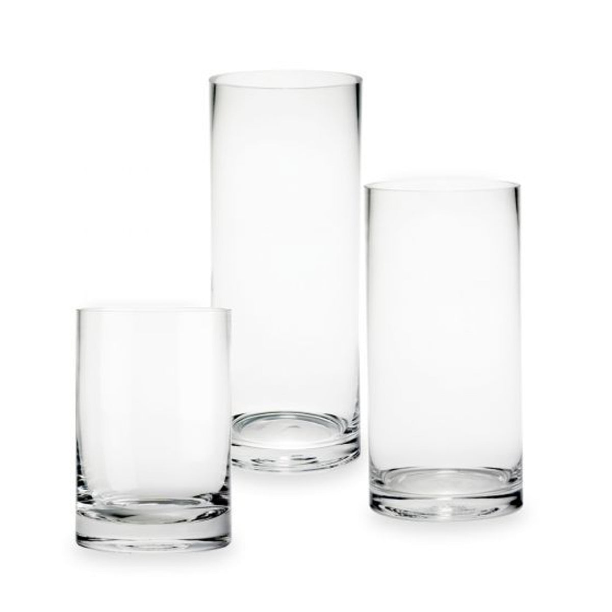 Three clear glass cylinder vases in small, medium and tall sizes on white