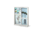 An Umbra Edge Marble Frame with three pictures and a palm tree.