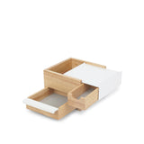 A Umbra MINI STOWIT JEWELRY BOX NATURAL/WHITE with two drawers for storage.