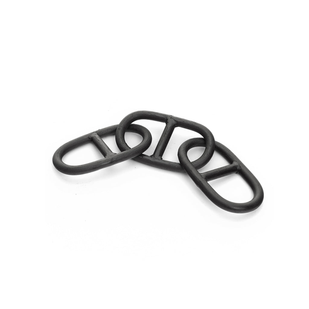 Three interlocking matte black iron chain links, each with a crossbar, on a plain white background
