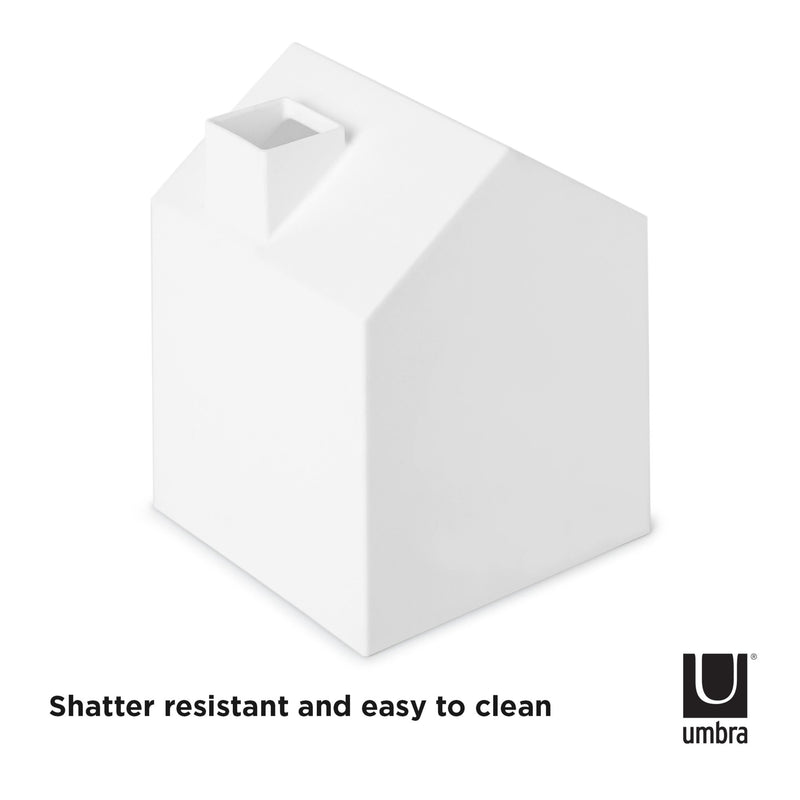 A Casa Tissue Box Cover White with the brand Umbra, with the words shatter resistant and easy to clean.