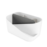 A white Umbra Glam Hair Tool Organizer box with a black and white phone in it.