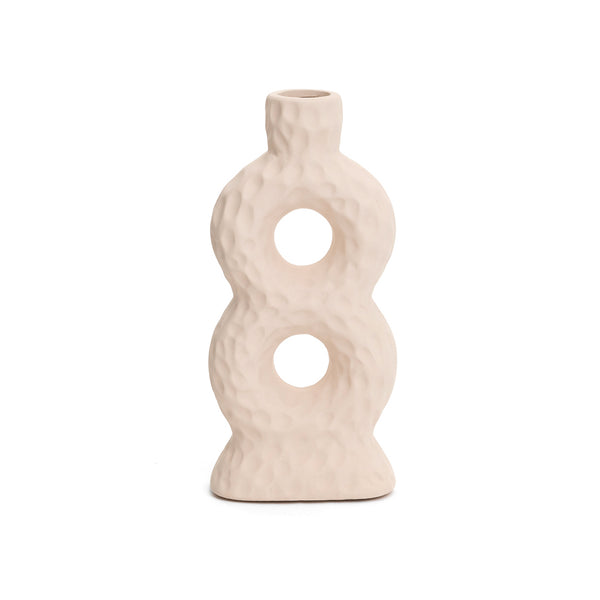 The Limited edition Bovi Home Collection Sicily Loop Texture Ceramic Vase, inspired by Sicily, features a stunning Loop Texture design consisting of intricate circles on a white ceramic surface.