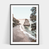 A framed print of CATHEDRAL COVE, COROMANDEL, NEW ZEALAND beach scene from Art Prints, ready for delivery.