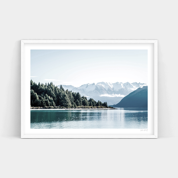 A framed print of LAKE WAKATIPU, NEW ZEALAND with mountains in the background, available for purchase by Art Prints.