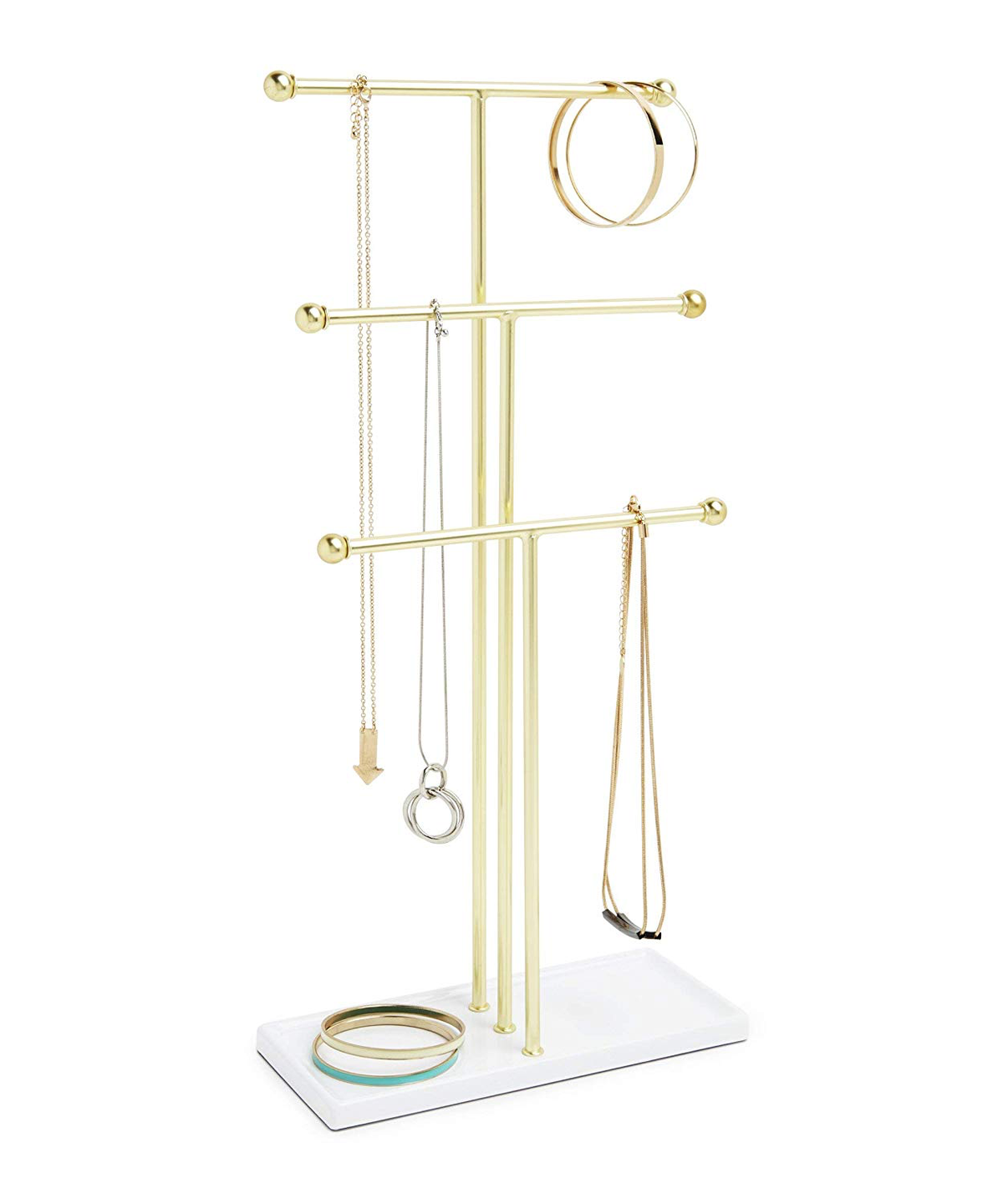 Umbra Trigem brass jewelry stand displaying necklaces on three tiers