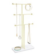 An Umbra TRIGEM JEWELRY STAND displaying a selection of necklaces, providing a tangle-free solution for necklace organization.