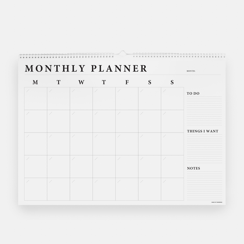 A white Monthly Wall Planner with the words Made of Tomorrow on it.