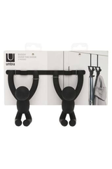 A pair of black monkeys, known as Buddy, playfully hanging from an Umbra BUDDY OVER THE DOOR HOOK BLACK.