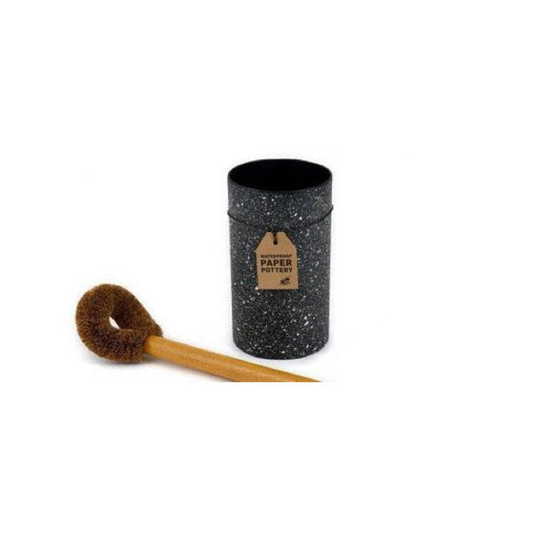 A sustainable Ecomax DALBY BLACK GRANITE TOILET BRUSH HOLDER with a wooden brush next to it.