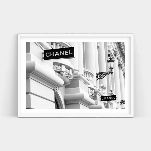 A black and white photo of a CHANEL sign by Art Prints.