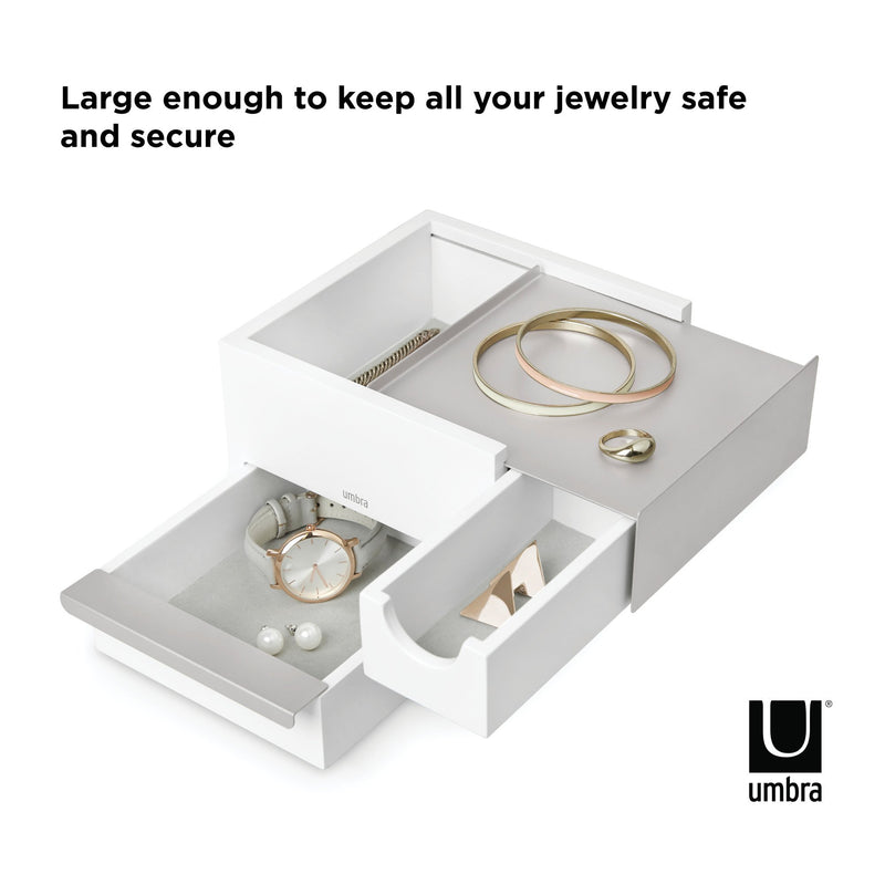 This Umbra STOWIT MINI JEWELRY BOX WHT/NKL features hidden compartments and a drawer organizer, offering ample space to keep your prized collections safe and secure.