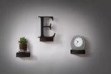 Three Set (3) Showcase Shelves - Black from the exclusive Umbra range, featuring the letter e and a clock.
