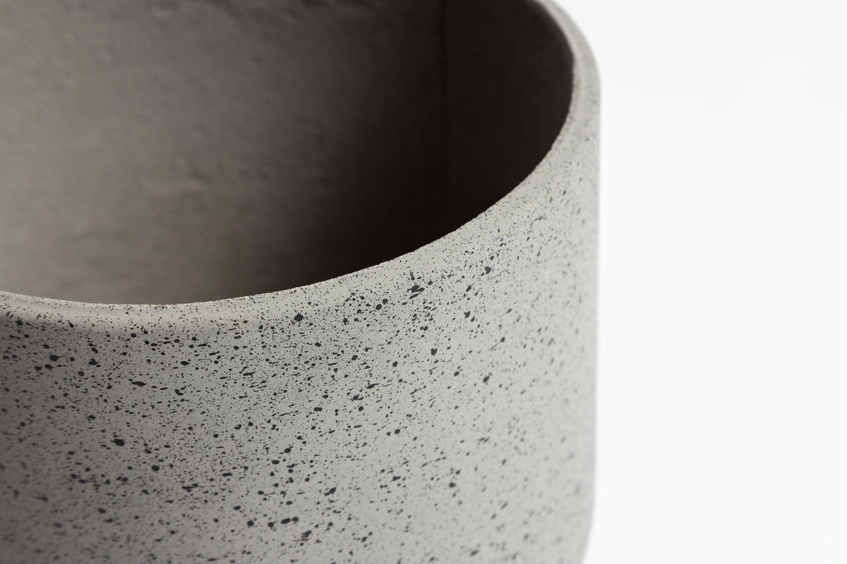 Rustie Pot Set smallest size styled with a fern in a bathroom