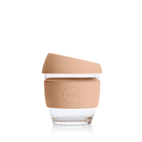 A Joco Cups | Takeaway Cup - 4oz with a lid and a straw on a white surface.