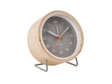 A Karlsson Alarm Innate - Various Colours with a wood casing.