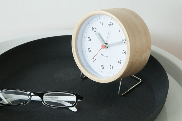 A black tray with a Karlsson Alarm Innate - Various Colours and glasses on it.