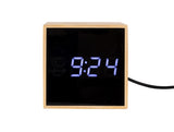 Aesthetically pleasing Karlsson Alarm Mini Cube clock with blue LED lights.