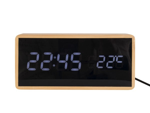 A minimalist Scandinavian clock, the Karlsson Alarm Tube, features a digital display.