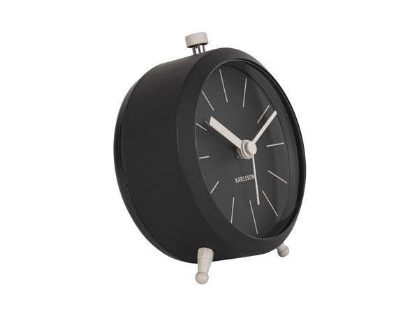 Black Karlsson Button alarm clock, angled view