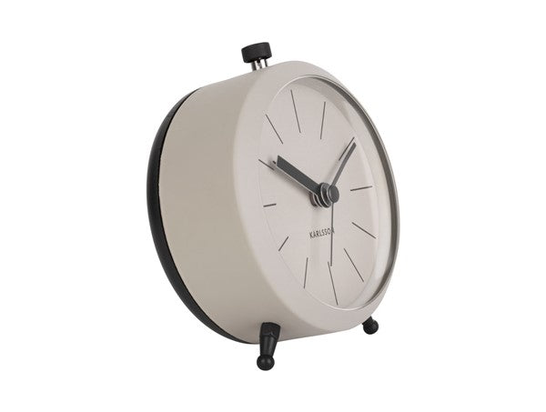 Warm grey Karlsson Button alarm clock, angled view