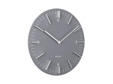 A Karlsson Clock - Detailed - Various Colours on a white background.