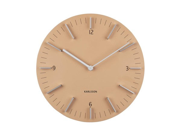 Detailed wall clock in sand, front view showing the raised hour markers