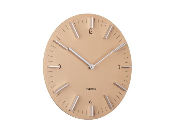 Detailed wall clock in sand, angled view