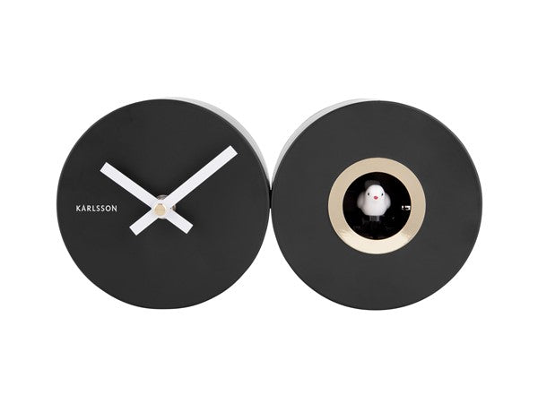 A Duo Cuckoo clock from the Karlsson range featuring a black and white design.