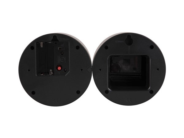 An open face Karlsson Duo Cuckoo wall clock with a red light on it.