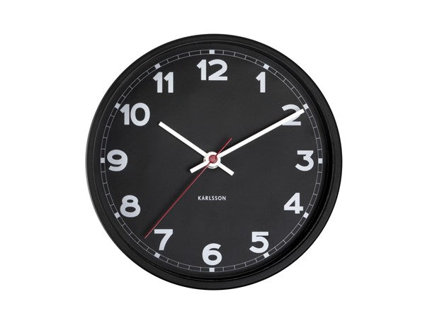 A new Karlsson clock with a classic design on a white background.