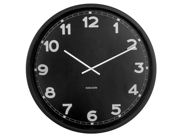 Karlsson New Classic wall clock in black, close front view of the pale numerals