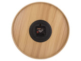 A Pure - Various Options Karlsson wall clock with a black knob on it.