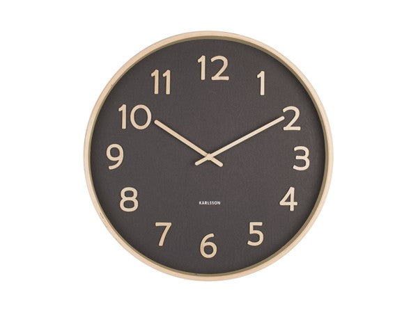 A Pure - Various Options wall clock by Karlsson, a Dutch clock brand, on a white background.