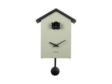 A Cuckoo Traditional - Various Options clock hanging on a wall.