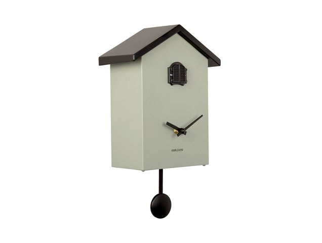 A Karlsson Cuckoo Traditional - Various Options wall clock with a bird house.