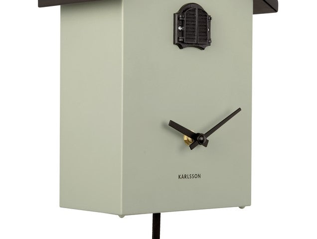 A Cuckoo Traditional - Various Options birdhouse with a Karlsson wall clock.