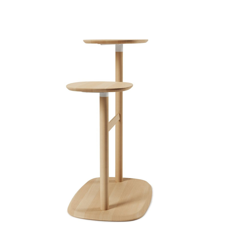 A Umbra Swivo Side Table - Natural with a shelf on top.