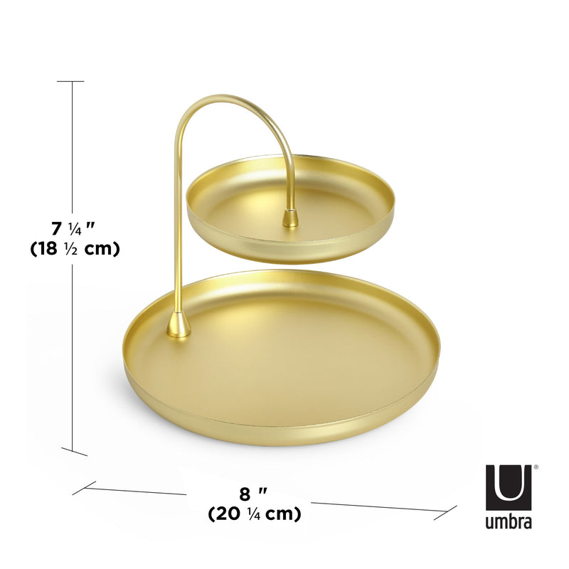 A Poise Two Tier Ring Dish Brass by Umbra, perfect for serving as a jewelry holder.