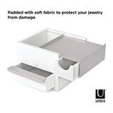 An Umbra STOWIT MINI JEWELRY BOX WHT/NKL with hidden compartments and a soft fabric to protect jewelry from damage.