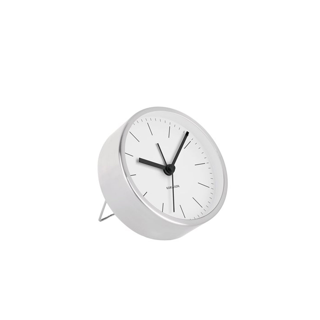 A Minimal Karlsson Alarm clock showcasing a sleek design on a white surface.