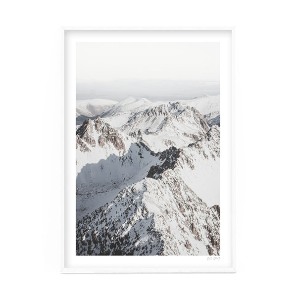 An exquisite MOUNT COOK, NEW ZEALAND snowy mountain range photo elegantly presented within a white frame by Art Prints.