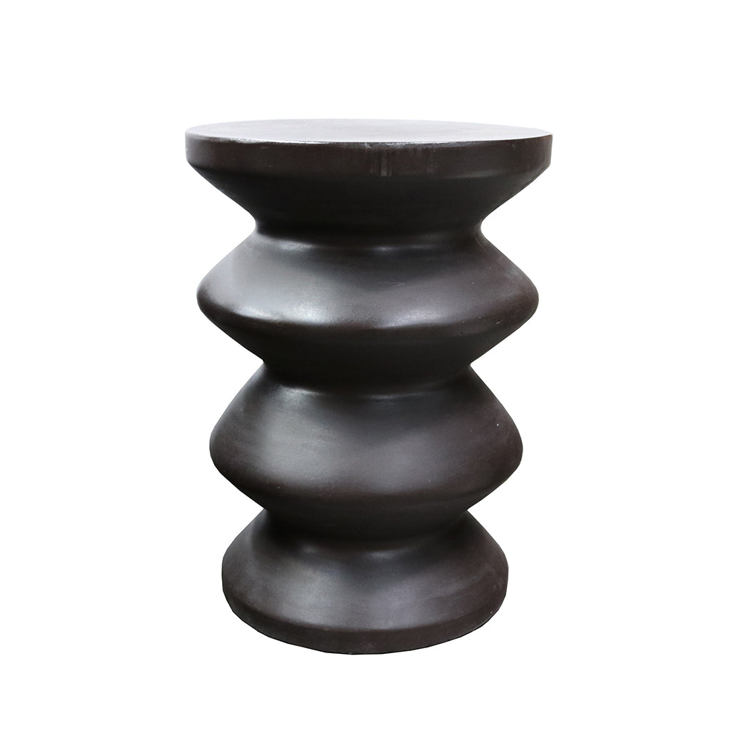 Nara stool in dark brown with a stacked ring form, on a plain background