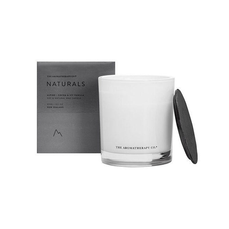 A Naturals Candle Alpine - Cocoa & Icy Vanilla from The Aromatherapy Co, accompanied by a black box.