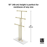 A tangle-free TRIGEM JEWELRY STAND - BRASS, perfect as a necklace holder for any size, by Umbra.